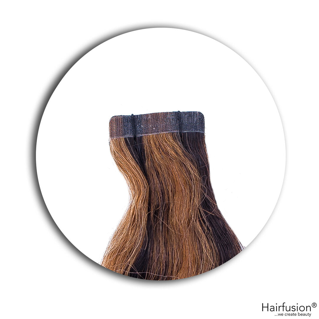 Outlet Nr. 154 – 10 Tape Extensions – Farbe gesträhnt 1B/6 – 45–50 cm – gewellt